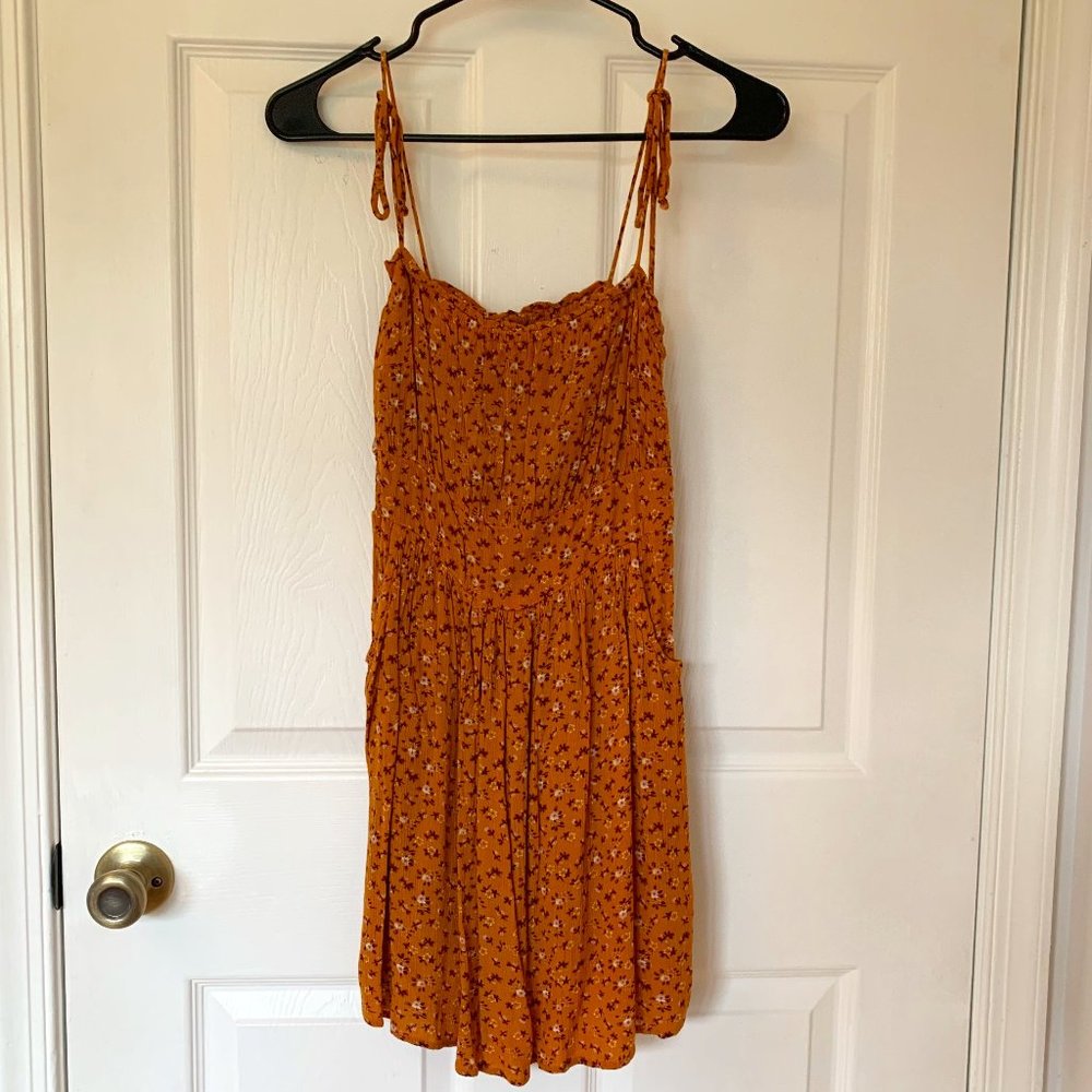 Mustard yellow dress with flowers and pockets, size 2